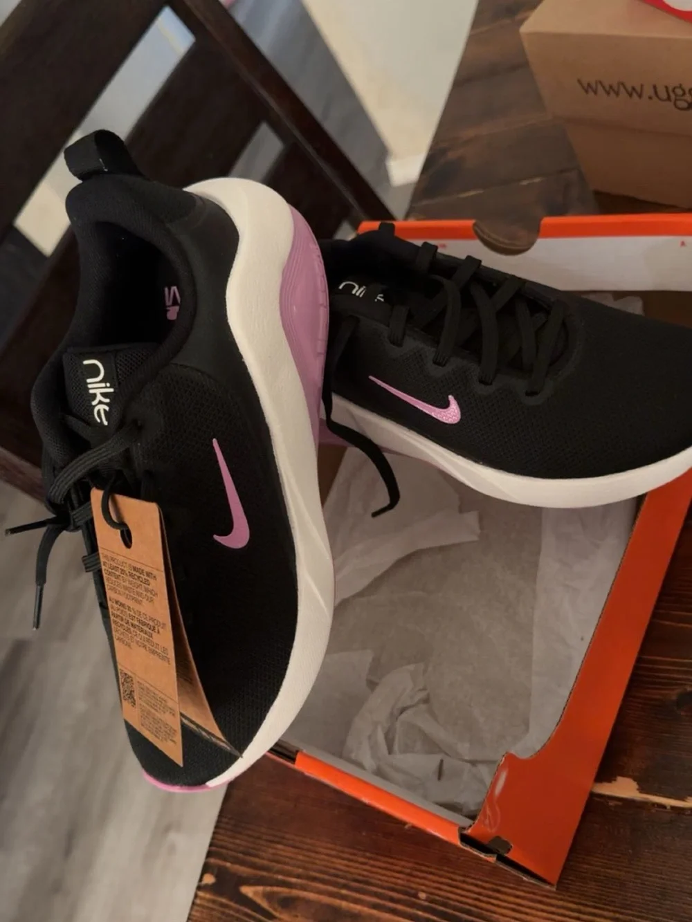 Nike Women's Black Athletic Sneakers with Pink Swoosh